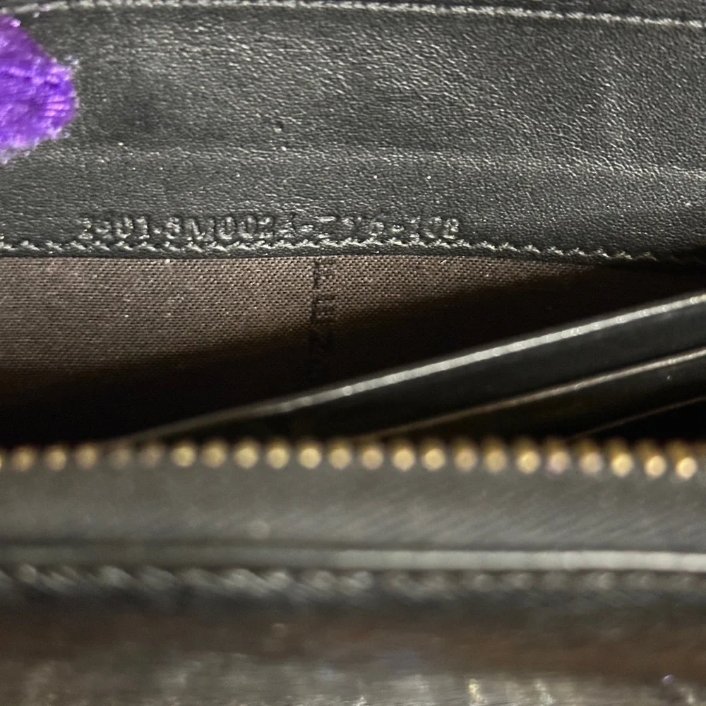 Vintage Fendi black patent leather zip-around continental wallet.